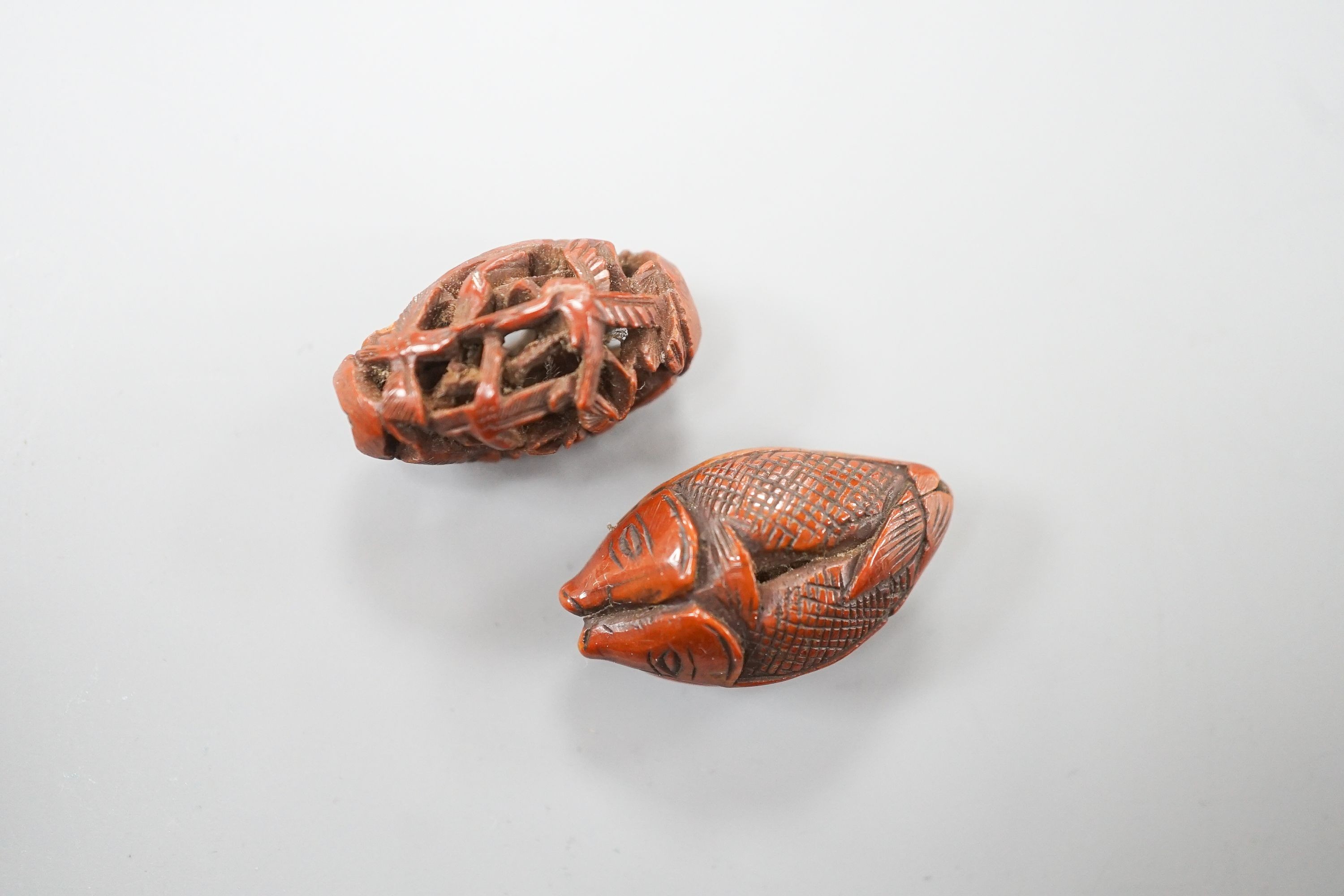 Two Chinese peach stone carvings